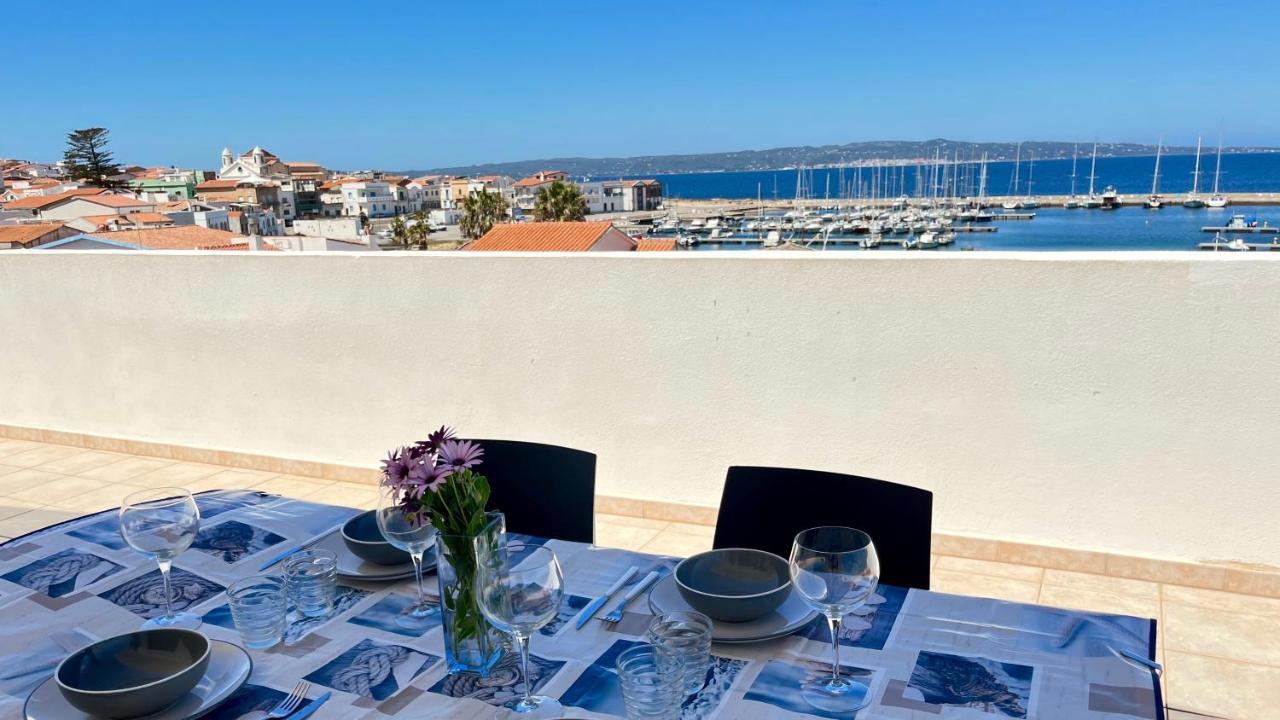 Attici Con Terrazzo Vista Mare Leilighet Calasetta Eksteriør bilde