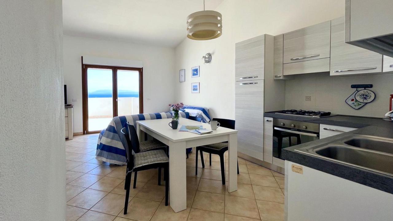 Attici Con Terrazzo Vista Mare Leilighet Calasetta Eksteriør bilde