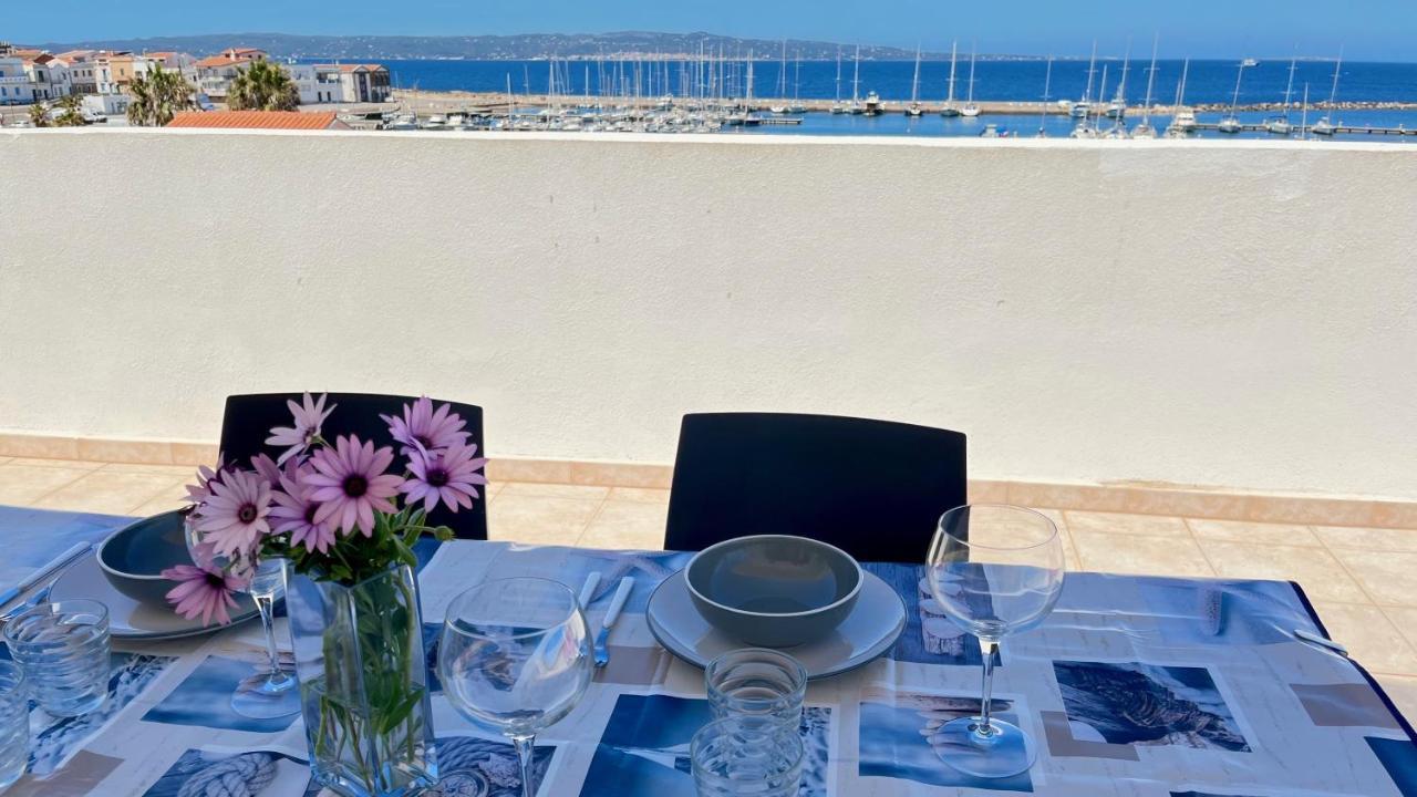 Attici Con Terrazzo Vista Mare Leilighet Calasetta Eksteriør bilde